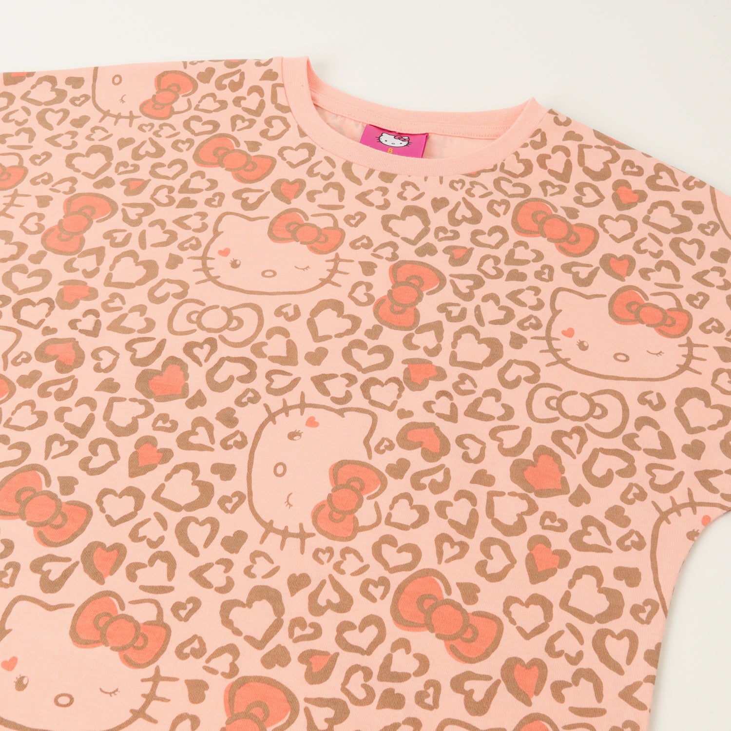 Polera Manga Corta Niña Animal Print Naranjo Hello Kitty