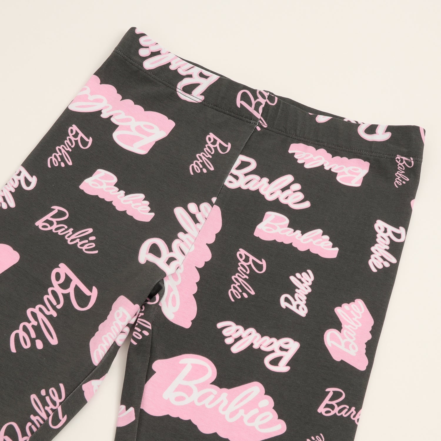 Calza Niña Full Print Logo Negro Barbie