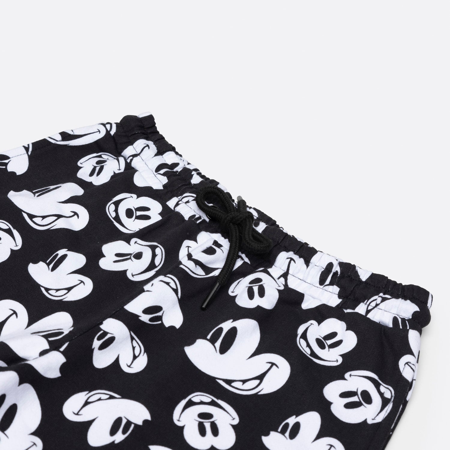 Pantalon de Buzo Niño Full Print Mickey Gris Disney