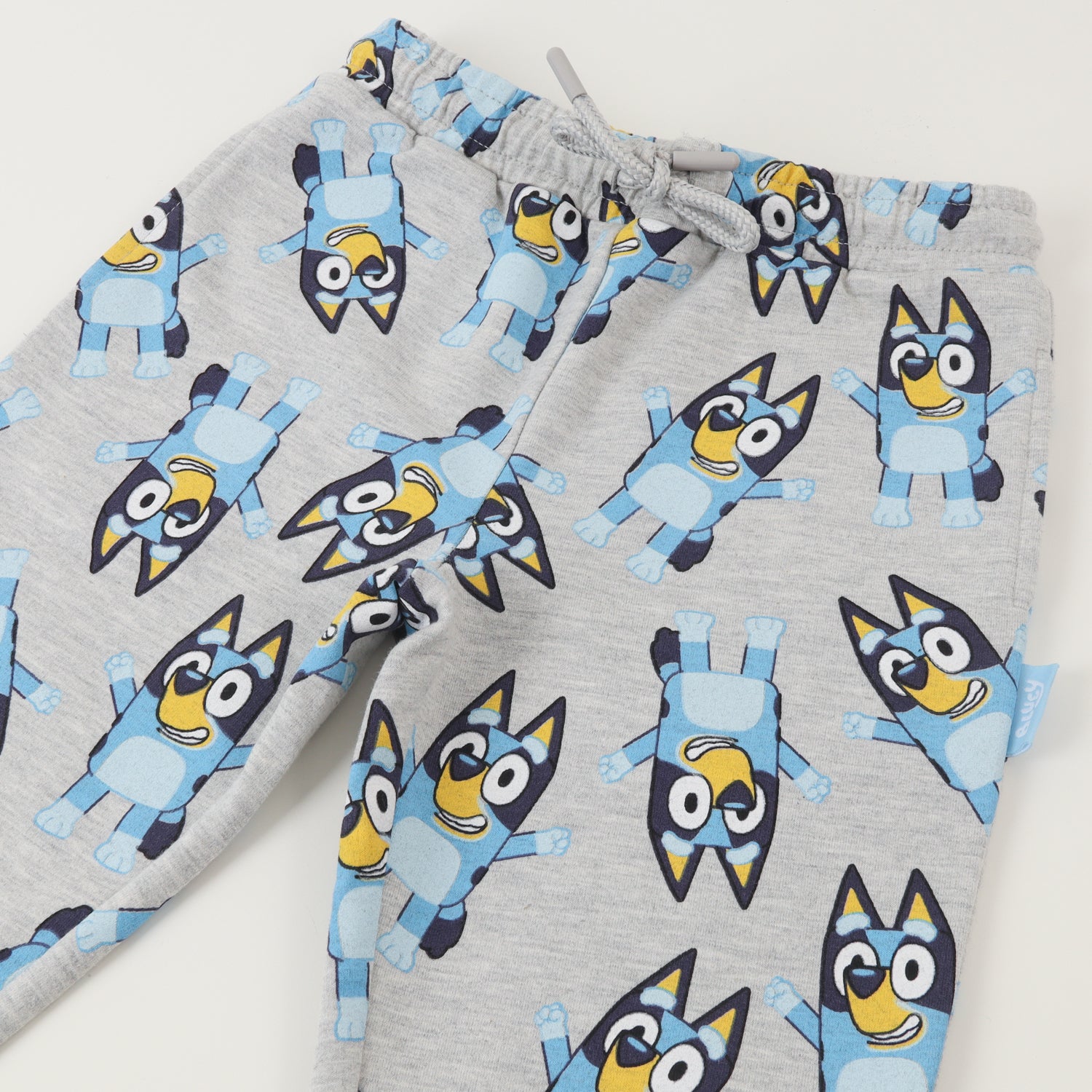 Pantalon De Buzo Niña Siluetas Gris Bluey