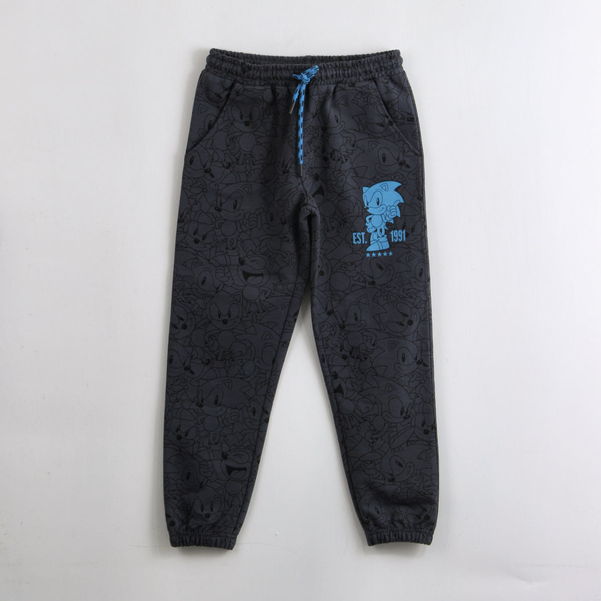 Pantalón de Buzo Niño Full Print Negro Sonic - Pantalones Chile | The Brands Club cl