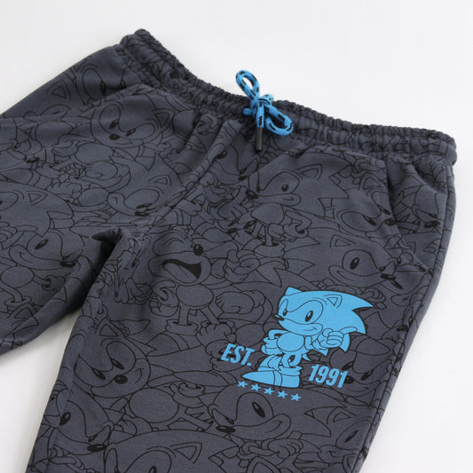 Pantalón de Buzo Niño Full Print Negro Sonic - Pantalones Chile | The Brands Club cl