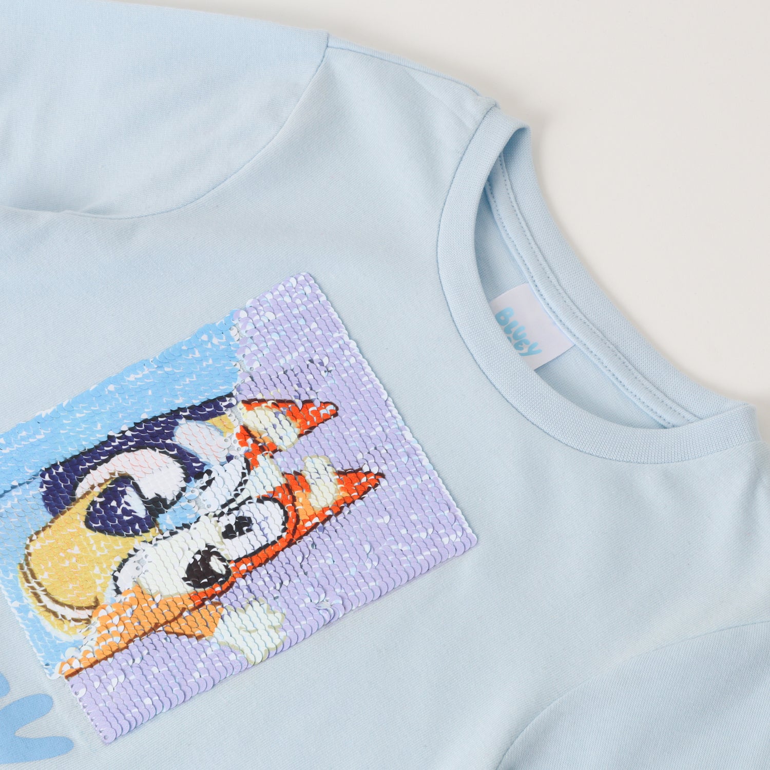 Polera Manga Larga Niña Reversible Celeste Bluey