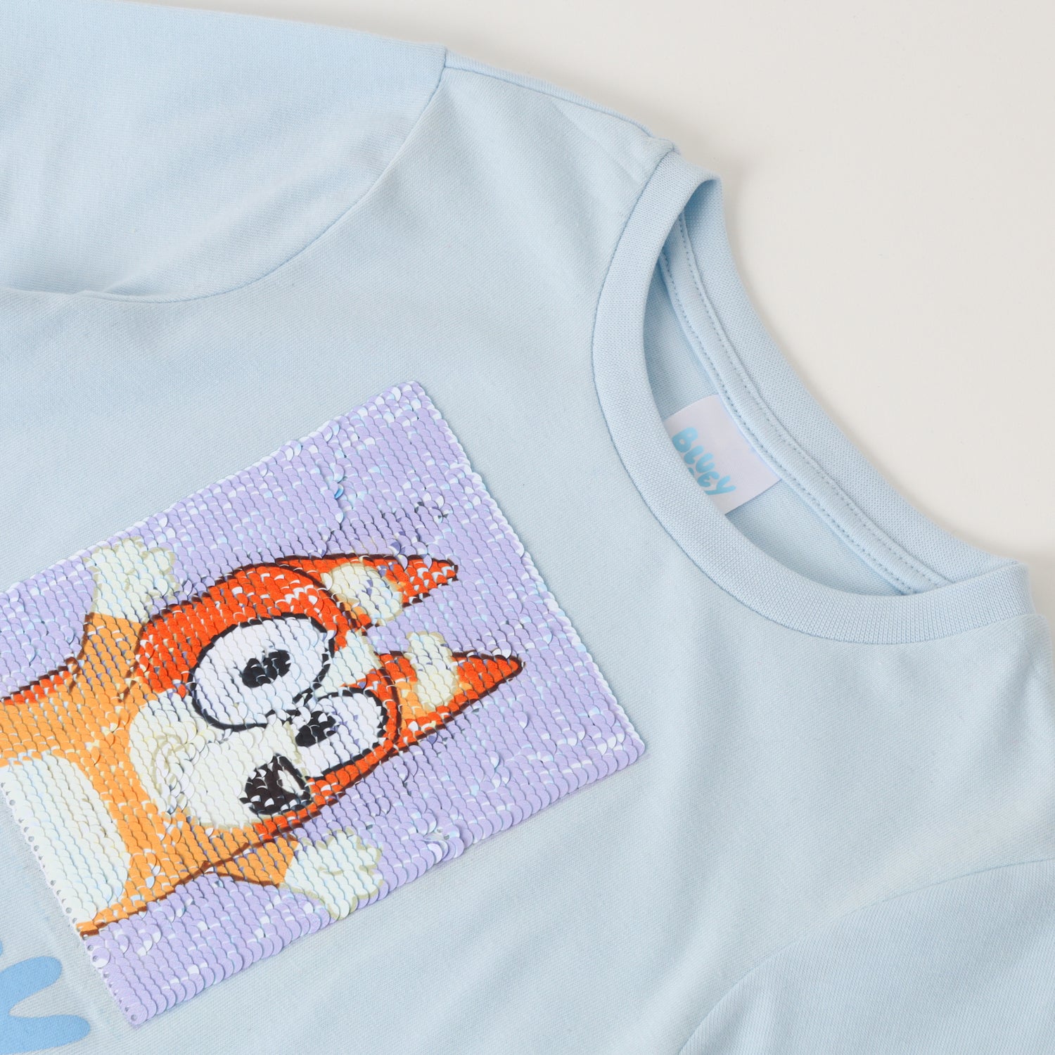 Polera Manga Larga Niña Reversible Celeste Bluey