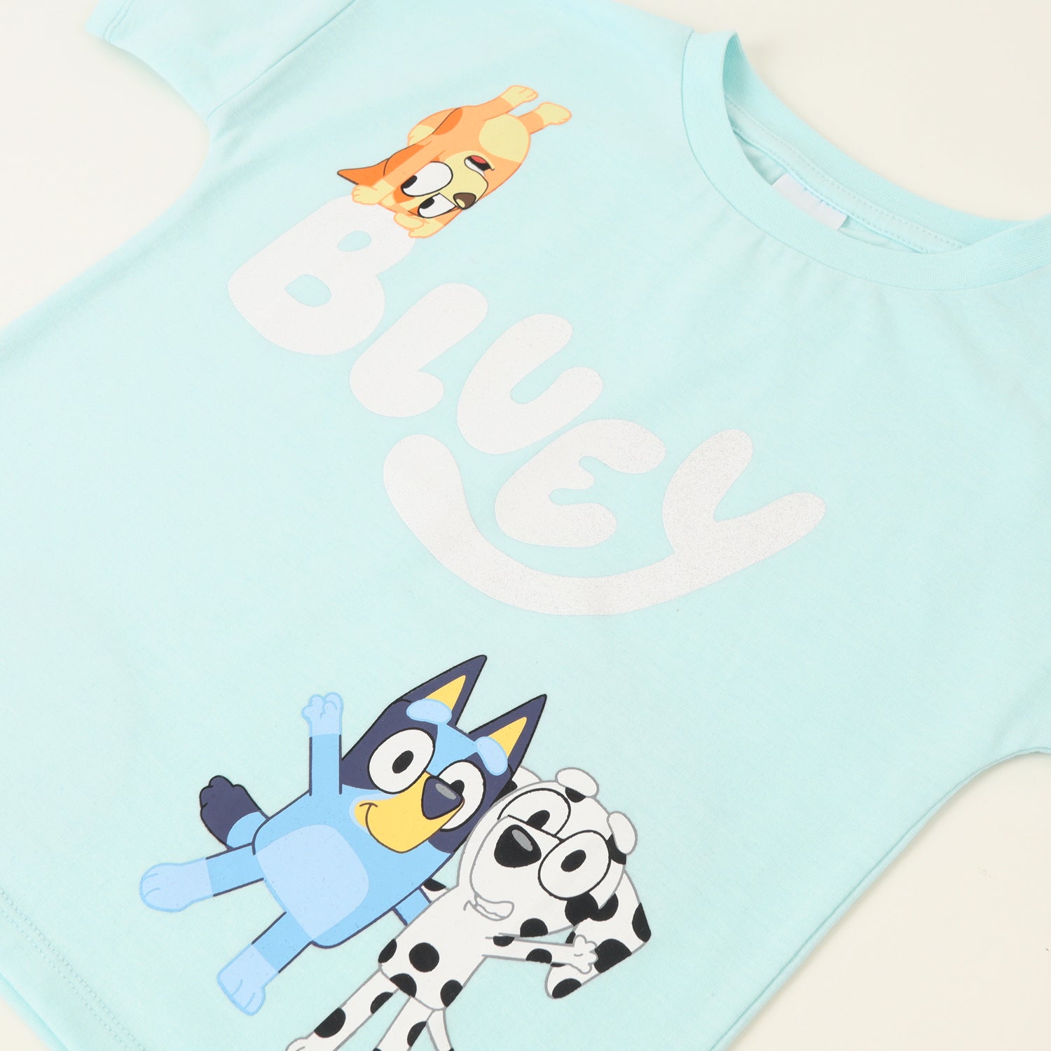 Polera Manga Corta Niña Logo Celeste Makenzie Bingo Y Bluey
