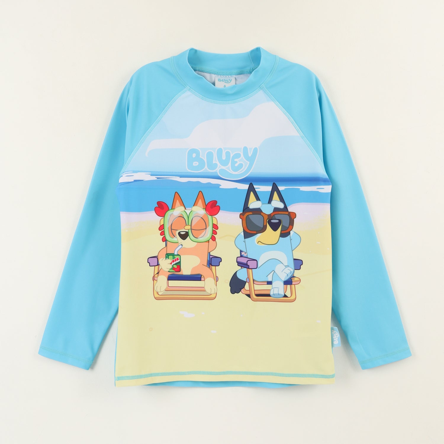 Polera UV Manga Larga Niño Celeste Playa Bingo & Bluey