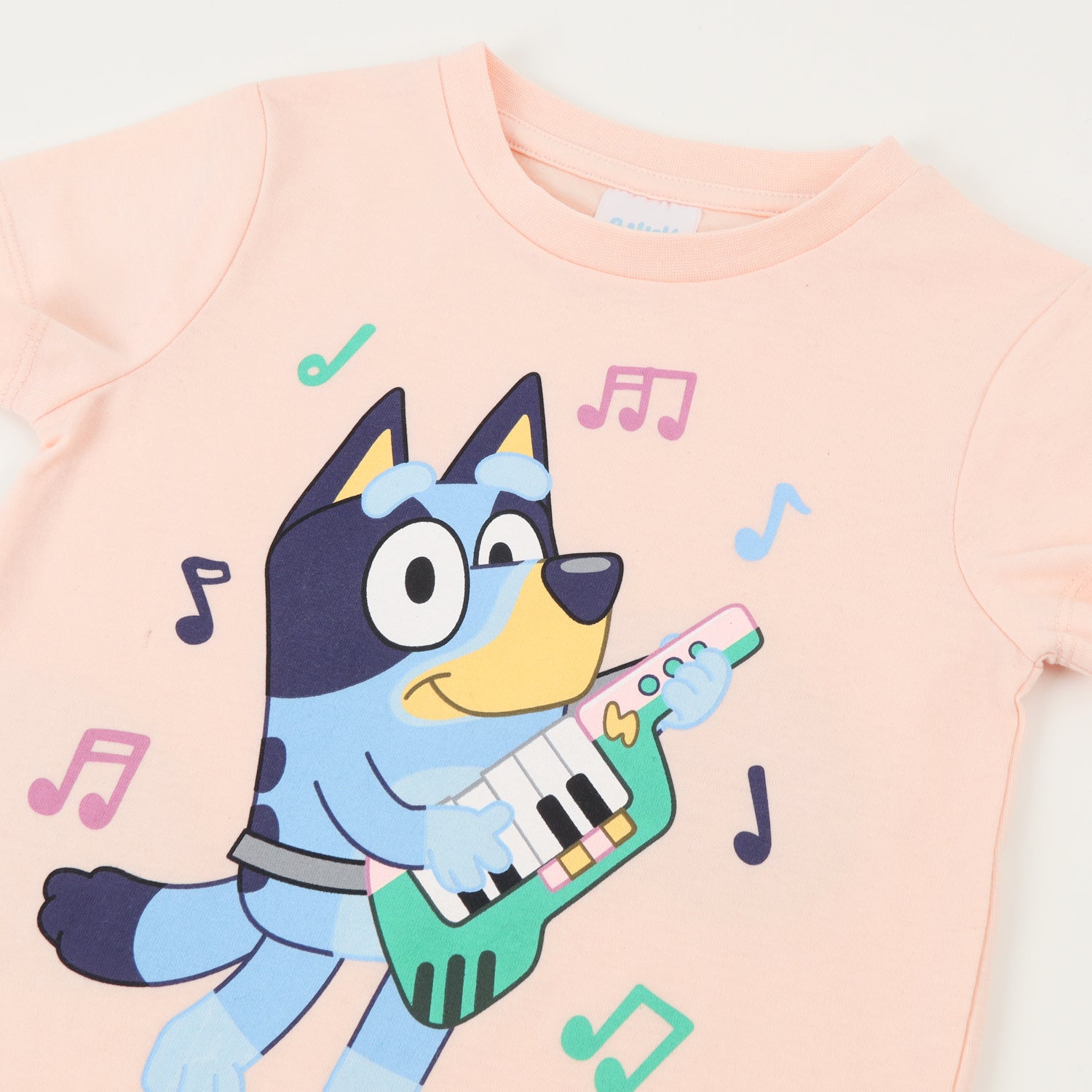 Polera Manga Corta Niña Naranjo Musica Bluey