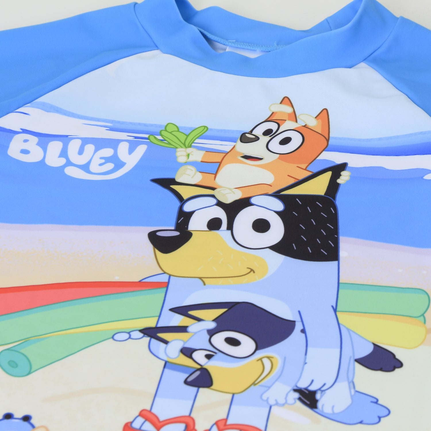 Polera UV Niño Turquesa Playa Bluey