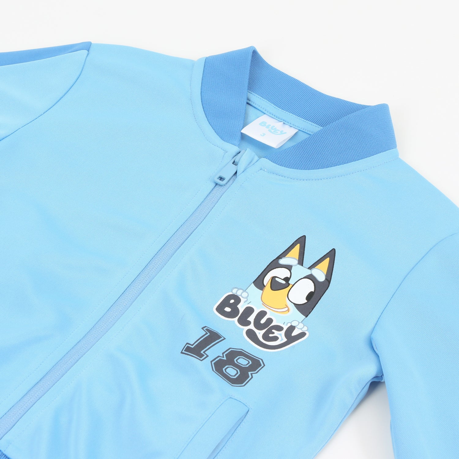 Polerón Deportivo Cierre Niño Fútbol Celeste Bluey - Polerones Chile | The Brands Club cl