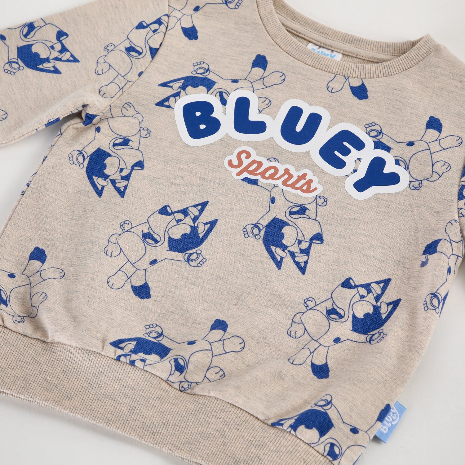 Polerón Cerrado Niño Full Print Beige Bluey